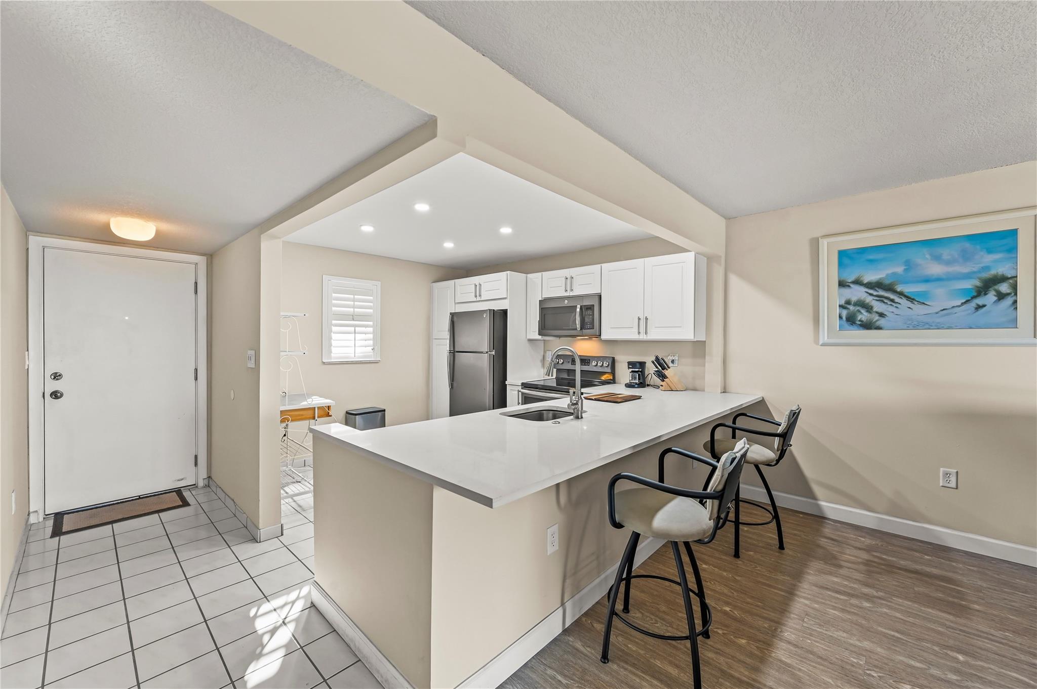 POINCIANA BY THE SEA COND - Residential