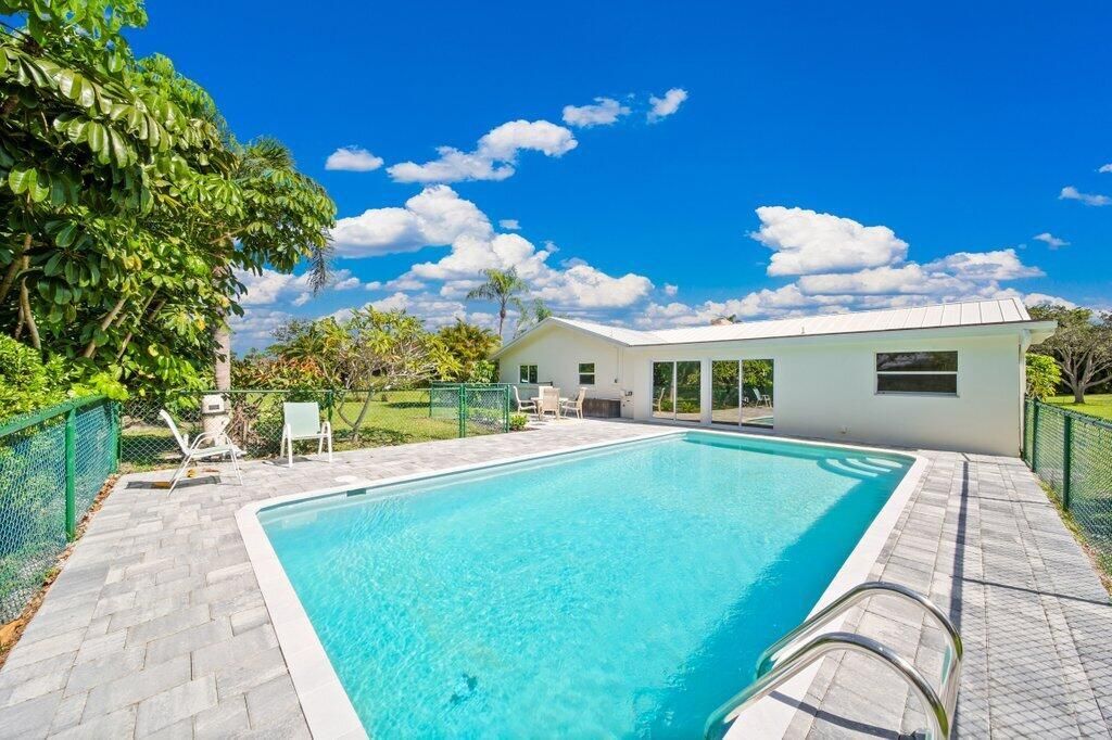 Photo of 2416 NW Everglades Boulevard, Stuart, FL 34994 (MLS # R11131990)