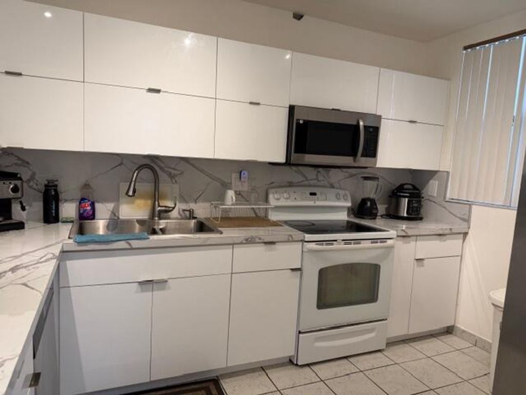 Photo of 8409 Forest Hills Drive, Coral Springs, FL 33065 (MLS # B26005045)