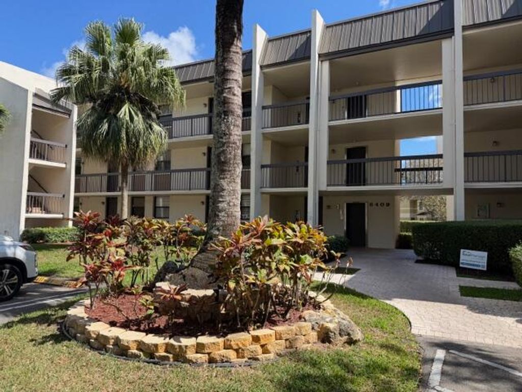 Photo of 8409 Forest Hills Drive, Coral Springs, FL 33065 (MLS # B26005045)