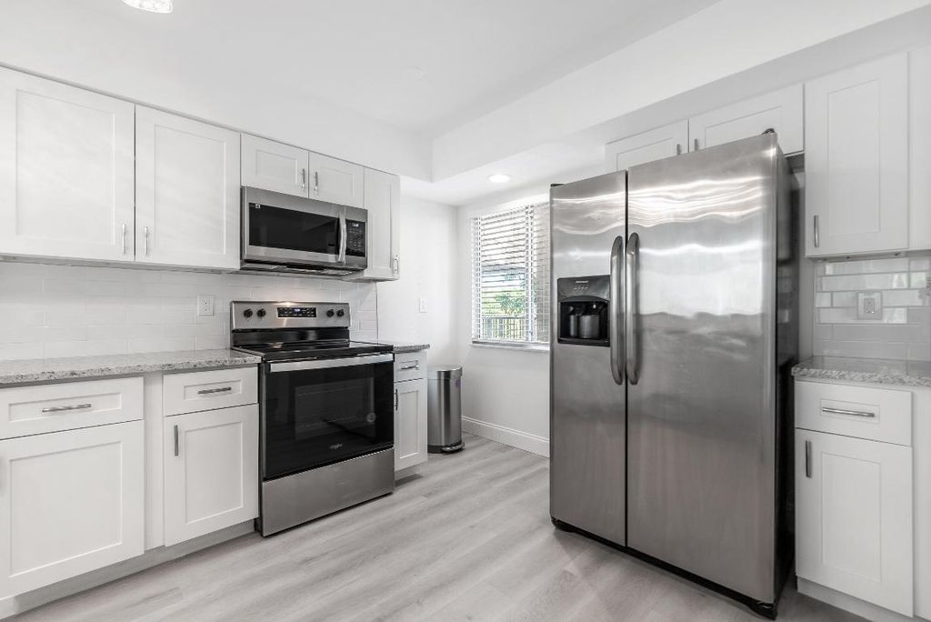 Photo of 2208 S Cypress Bend Drive #407, Pompano Beach, FL 33069 (MLS # R11137896)