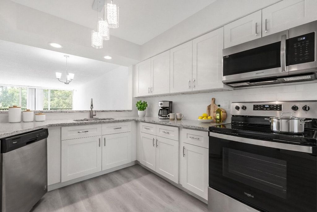 Photo of 2208 S Cypress Bend Drive #407, Pompano Beach, FL 33069 (MLS # R11137896)