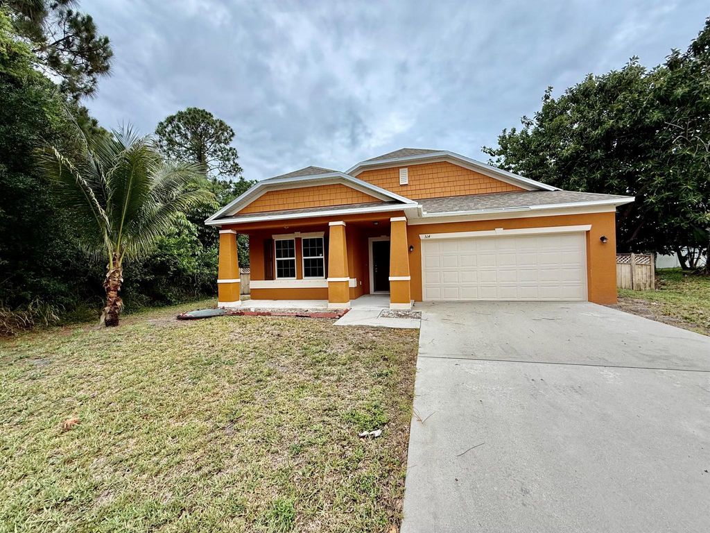 Photo of 514 NW Riverside Drive, Port Saint Lucie, FL 34983 (MLS # R11089877)