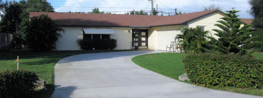 EXCELLENT VALUE IN THE JUPITER PINES NEIGHBROHOOD. 3 BEDROOM 1 STORY RANCH HOME ON A QUIET RESIDENTIAL STREET. ROOF REPLACED IN 2014. LARGE LOT ON THE CANAL. LARGE CURVED DRIVEWAY TO SIDE MOUNT GARAGE. HOME HAS AN OVERSIZED SCREENED IN PORCH. HURRY THIS WON'T LAST!!