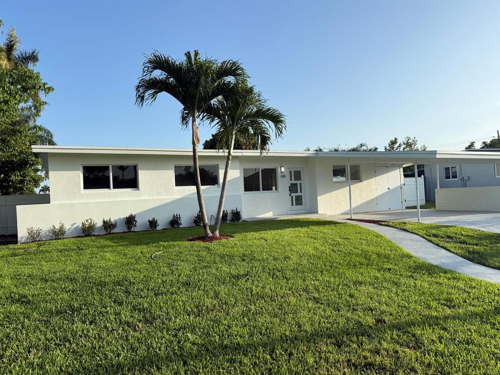 Photo of 345 Pinehurst Road, Palm Springs, FL 33461 (MLS # R11096385)