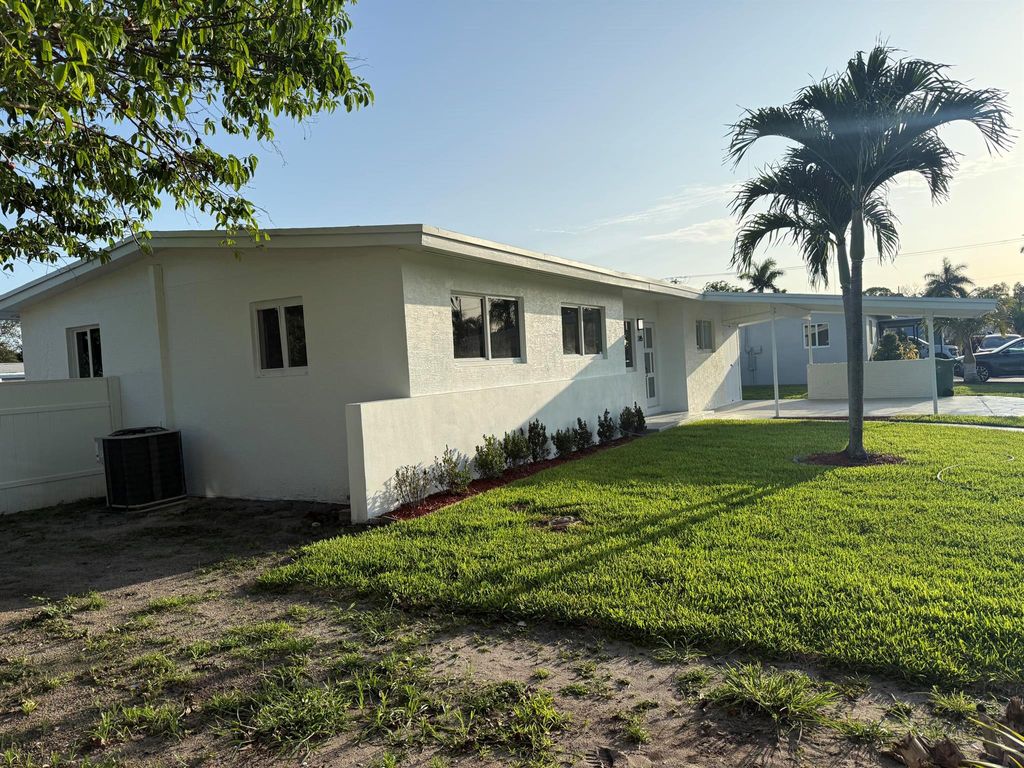 Photo of 345 Pinehurst Road, Palm Springs, FL 33461 (MLS # R11096385)