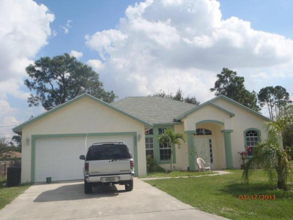 Photo of 2597 SW Calder Street, Port Saint Lucie, FL 34953 (MLS # R11013459)
