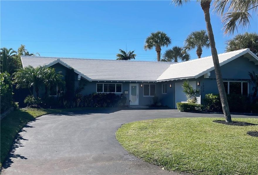 Terrific NE FTL Location. Priced to Sell. This Pool House is Completely Renovated. Featuring an Open Floorplan, Gourmet Kitchen Walk-in Pantry, Quartz Counters, Stainless Steel Appliances, Large, Open Center Peninsula and New Wolf Induction Range w/Hood. Elegant Dining Area w/Separate Dining Patio. Living Room Overlooks a Spacious, Open Lanai and Tropical Garden. Primary Bath Has Lovely Pool, Waterfall & Garden View w/Cabana Bath and Large Walk-in Closet. All Bathrooms Updated Beautifully. Storm Impact Windows & Doors. Laundry Room w/Storage & Walk-In Attic. Amazing, Bright Terrazzo Floors Throughout. Brand New Raised Tile Roof. Salt-Water Pool w/Autofill. Freshly Painted In & Out. Close to Shopping, Dining, Beaches, Entertainment, Access to I-95, FLL AP &Everglades FTL Cruise Port.