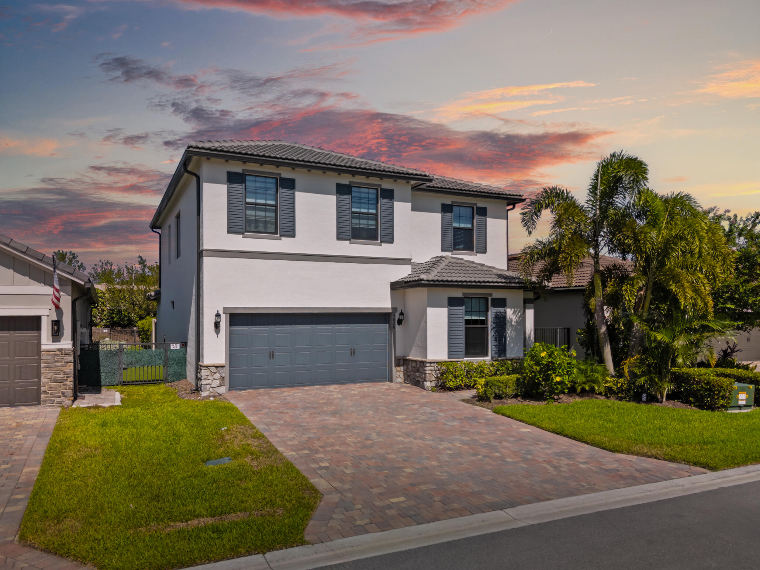 Located in the highly desirable gated community of The Fields, this beautifully customized two-story residence combines modern luxury with thoughtful design. Featuring 3 bedrooms, a dedicated den/office, 2.5 bathrooms, and an upstairs loft, this home offers flexible living spaces ideal for both everyday comfort and entertaining.From the moment you enter through the custom impact-resistant stained glass door, you'll be welcomed into a light-filled, open-concept layout. The centerpiece of the home is the chef-inspired kitchen, equipped with solid wood cabinetry, quartz countertops, a gas range, high-end appliances, and a spacious center island perfect for gathering and hosting. With three separate pantries, an adjacent mudroom, and a functional flow to