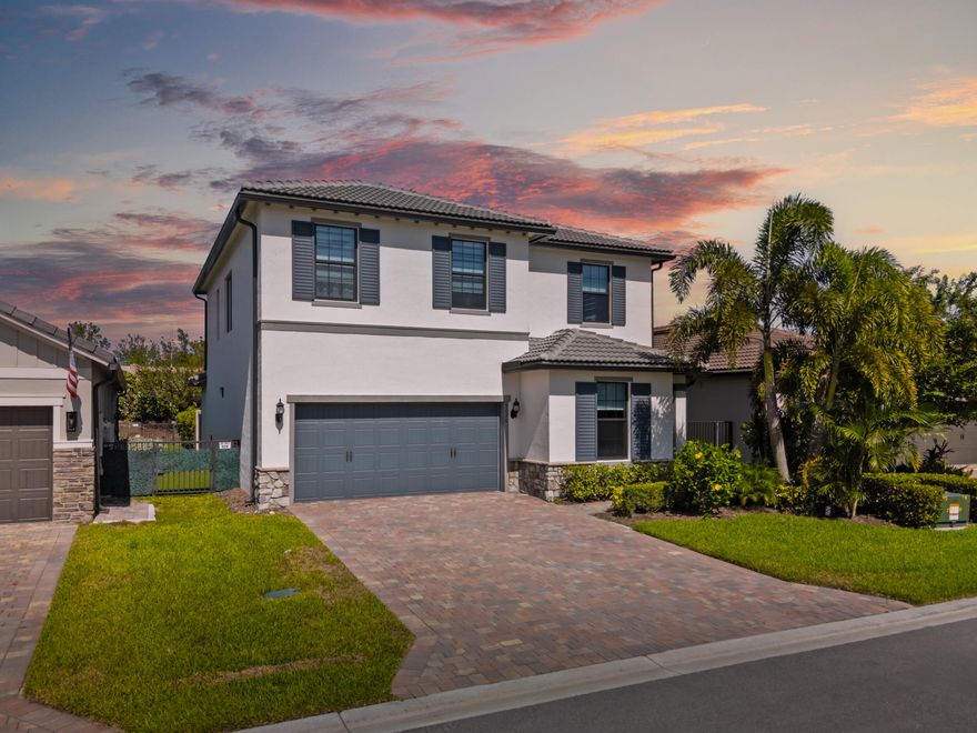 Located in the highly desirable gated community of The Fields, this beautifully customized two-story residence combines modern luxury with thoughtful design. Featuring 3 bedrooms, a dedicated den/office, 2.5 bathrooms, and an upstairs loft, this home offers flexible living spaces ideal for both everyday comfort and entertaining.From the moment you enter through the custom impact-resistant stained glass door, you'll be welcomed into a light-filled, open-concept layout. The centerpiece of the home is the chef-inspired kitchen, equipped with solid wood cabinetry, quartz countertops, a gas range, high-end appliances, and a spacious center island perfect for gathering and hosting. With three separate pantries, an adjacent mudroom, and a functional flow to