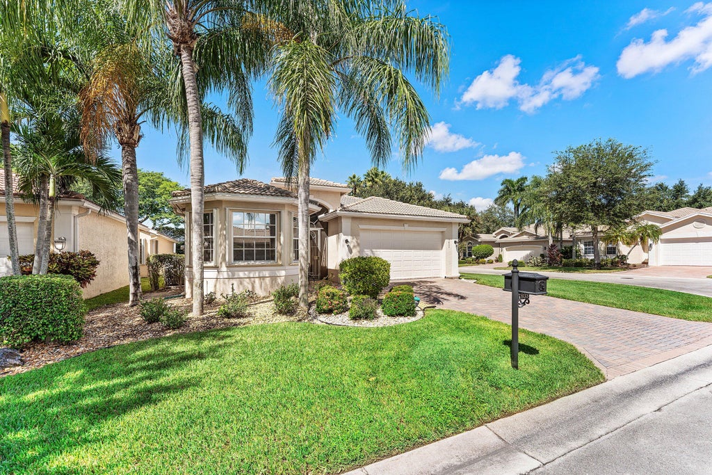 Photo of 7803 Sundial Harbor Pt. Pt, Lake Worth, FL 33467 (MLS # B26081957)