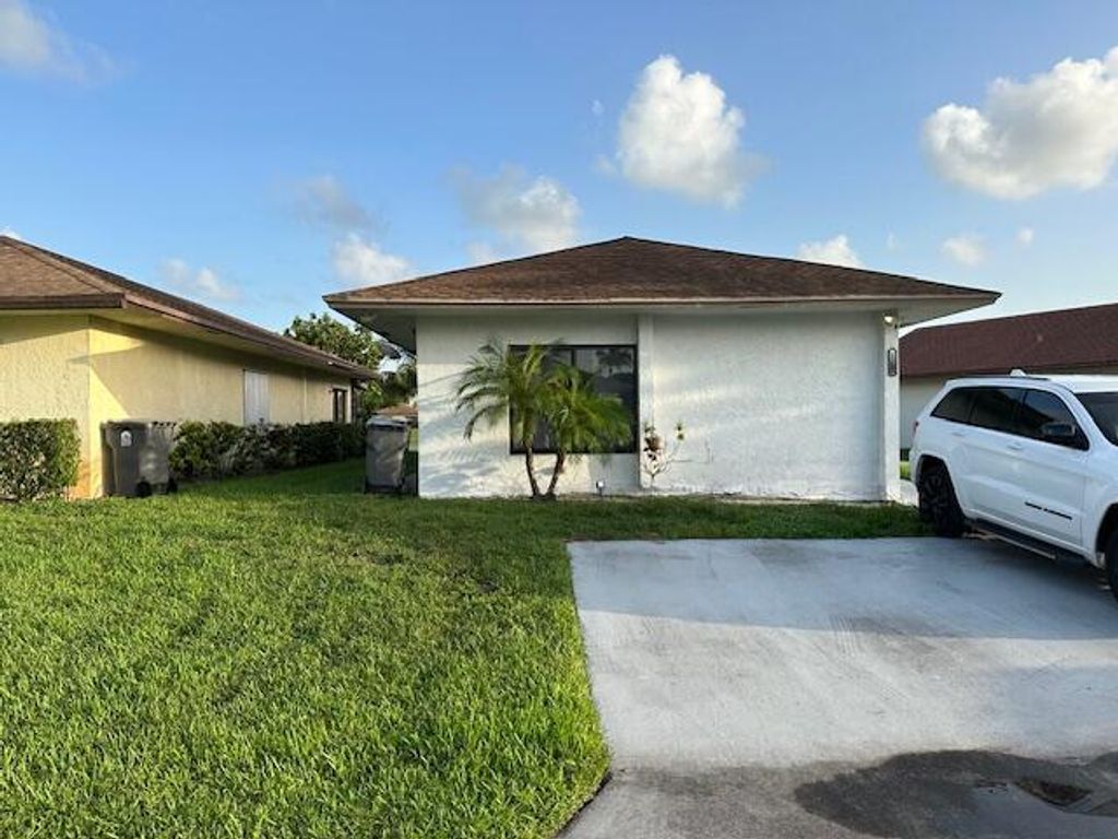 Photo of 5262 Garden Hills Circle, West Palm Beach, FL 33415 (MLS # R11109593)