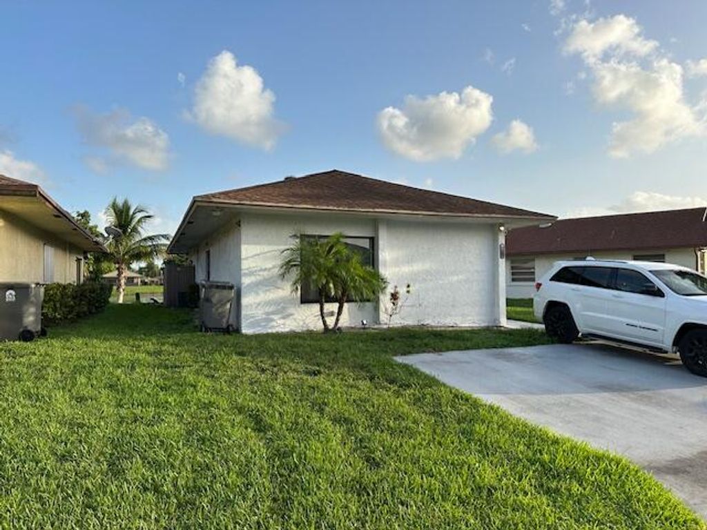 Photo of 5262 Garden Hills Circle, West Palm Beach, FL 33415 (MLS # R11109593)