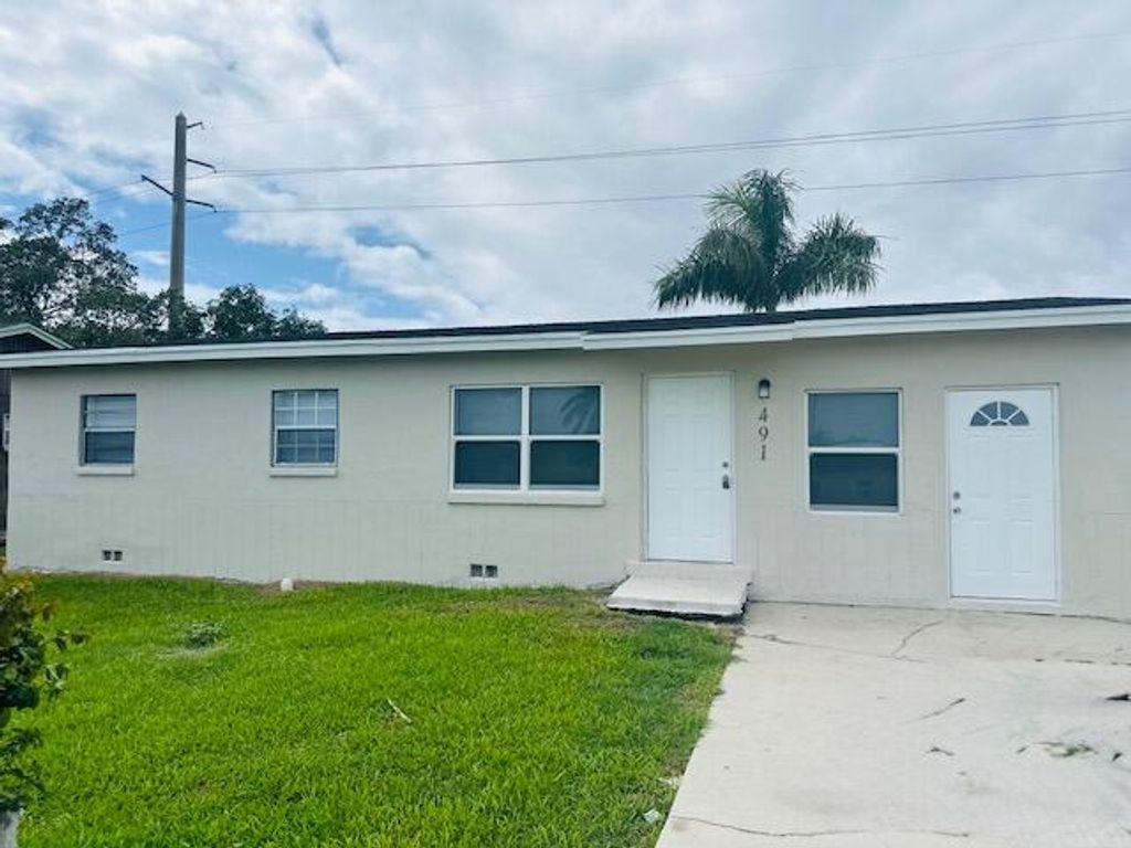 Photo of 491 W Jordan Boulevard, Pahokee, FL 33476 (MLS # R11159435)