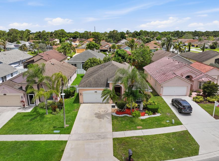 Well-maintained and ideally located just steps from the community pool and tennis courts, this home offers easy Florida living in a wonderful community setting. Inside, you'll find a bright, comfortable layout with split bedrooms for added privacy, an eat-in kitchen, and living spaces that feel practical and welcoming. The home has been cared for and offers plenty of natural light, making it easy to picture everyday life here. The 10-year-old roof is an added benefit, giving buyers extra peace of mind. Whether you're relaxing at home, enjoying the nearby amenities, or looking for a home that is easy to maintain, this one is a wonderful opportunity in a location that makes day-to-day living simple and enjoyable.   ** Sliding glass door in Living Room is being replaced and is on order**