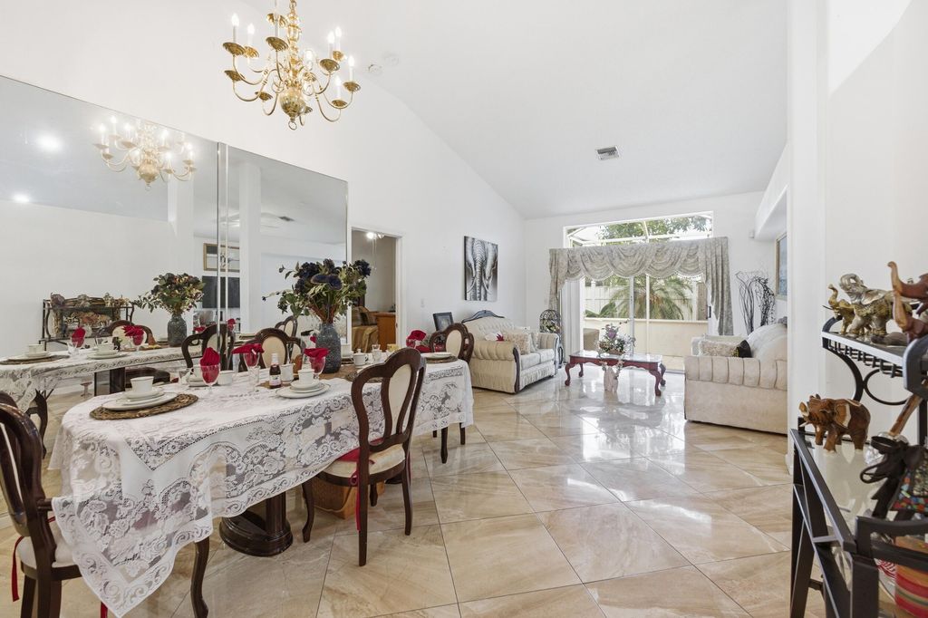Photo of 113 E Saratoga Blvd Boulevard E, Royal Palm Beach, FL 33411 (MLS # B26025527)