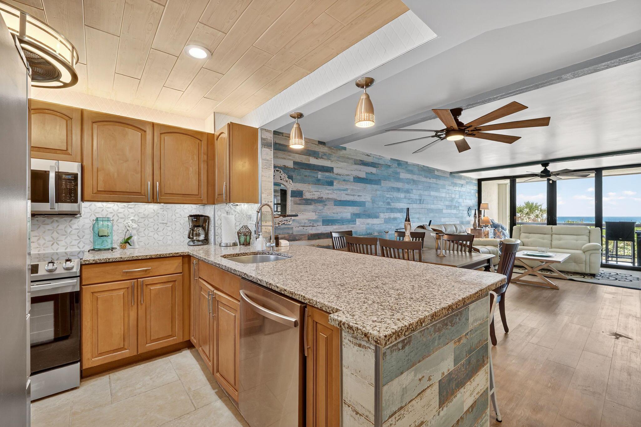 Beautiful beachfront property, meticulously updated, fusion alarm/cameras, full body massage chair, fully equipped kitchen with granite counter tops with custom lighting, situated in a gated community, formal lobby and an onsite manager. You will enjoy fantastic amenities including: A full kitchen, grilling areas, entertainment rooms, exercise room, tennis courts, and bocce ball courts. A large beach pavilion with pool, sauna and so much more.