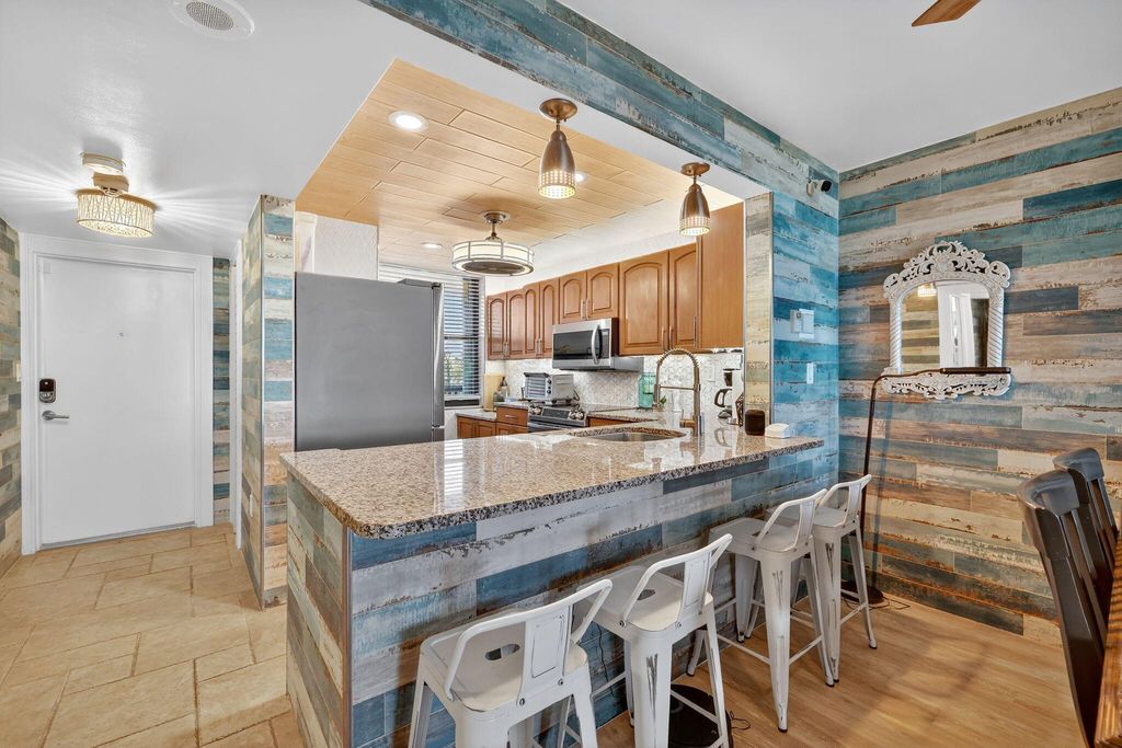 Photo of 10680 S Ocean Drive #105, Jensen Beach, FL 34957 (MLS # R11116855)