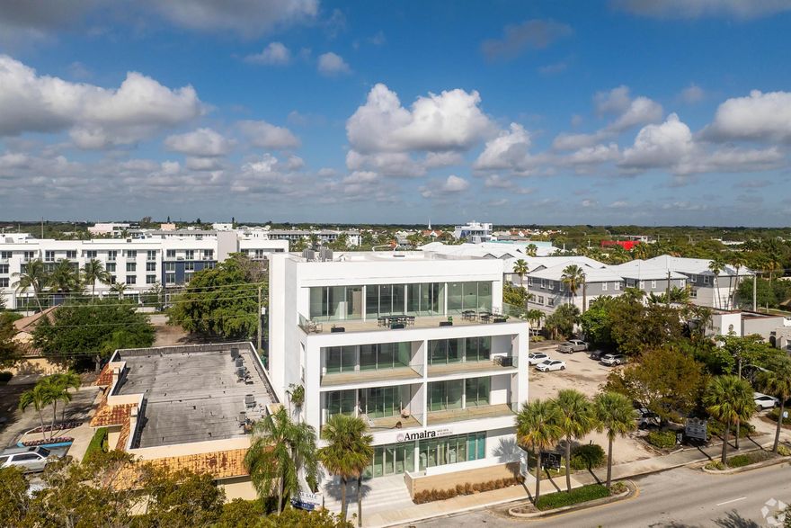 Income producing property for sale. Single tenant ground floor with ten year lease has options to renew. Buyer will own the ground floor with tenant in place. Great 1031 Asset.