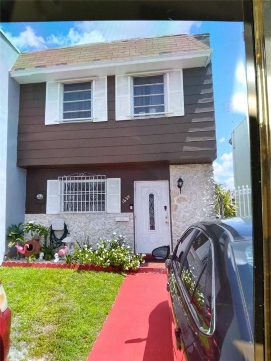 Beautiful townhome perfectly set in flamingo lake gorgeous water view A+ schools shopping centers all around,freshly painted perfect opportunity for  investors can be rented right away, ASSOCIATION ONLE $75.00 PER YEAR!! 3 bedrooms 1 1/2 bath very specious all tile floors, beautiful patio for family gatherings don't miss out on this beautiful townhome won't last please give 24hr notice to show.AS IS CONTRACTS ONLY, CONTINGENT ON APPRAISAL!!