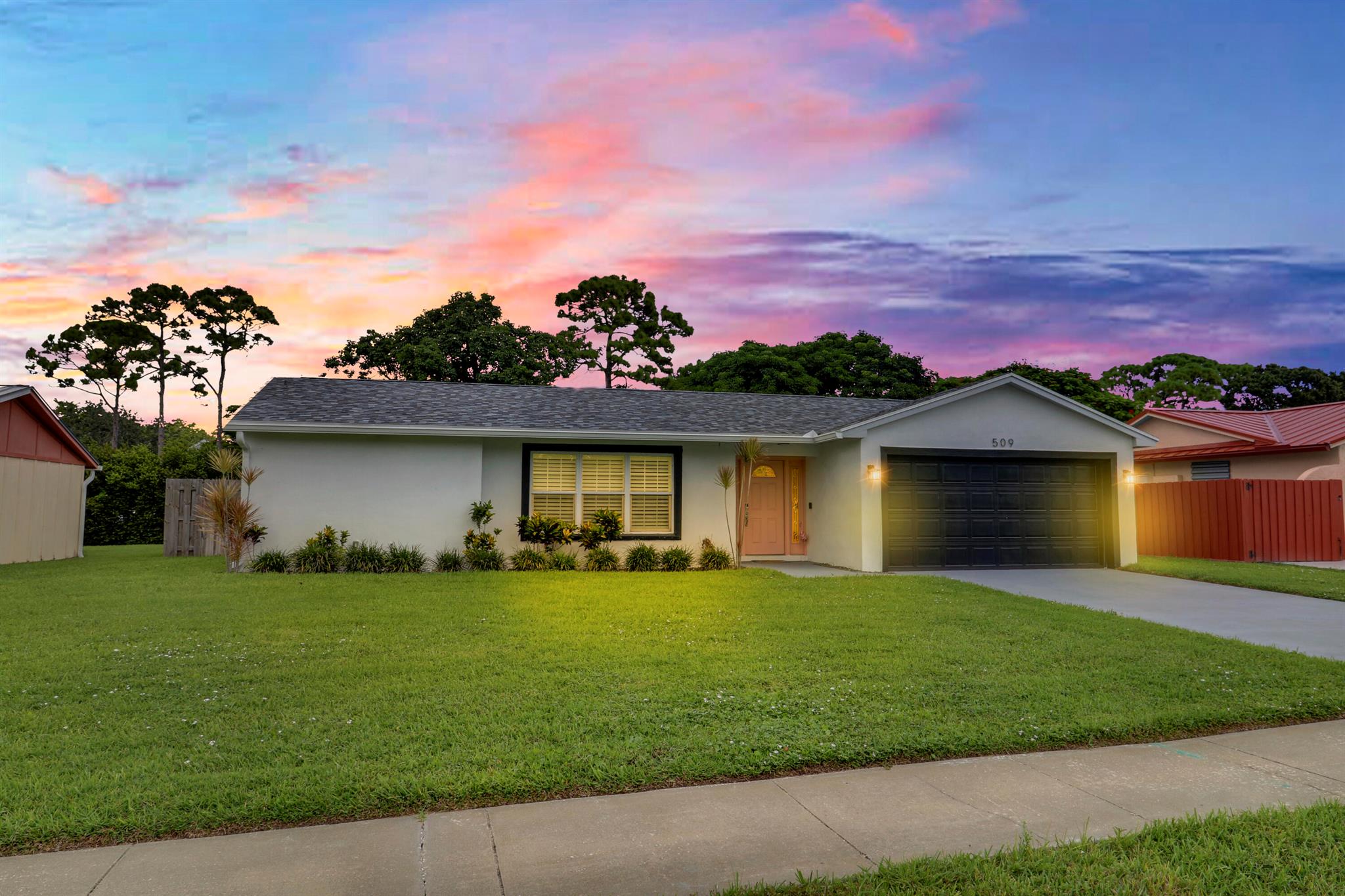 Experience the Best of Florida Living in this beautifully renovated 3-bedroom, 2-bath home just 10 minutes from Jupiter's pristine beaches. Designed with entertaining in mind, this home features wood-look tile flooring, quartz countertops, plantation shutters, a wine cooler, and abundant outdoor seating. French doors open to a spacious screened-in patio, where you can relax by the sparkling pool or gather around the fire pit in the fully fenced backyard, surrounded by mature shade trees.Enjoy everything Jupiter has to offer, world-class beaches, boating, paddleboarding, yoga on the sand, vibrant waterfront dining, and charming boutique shops--all just moments from your doorstep.