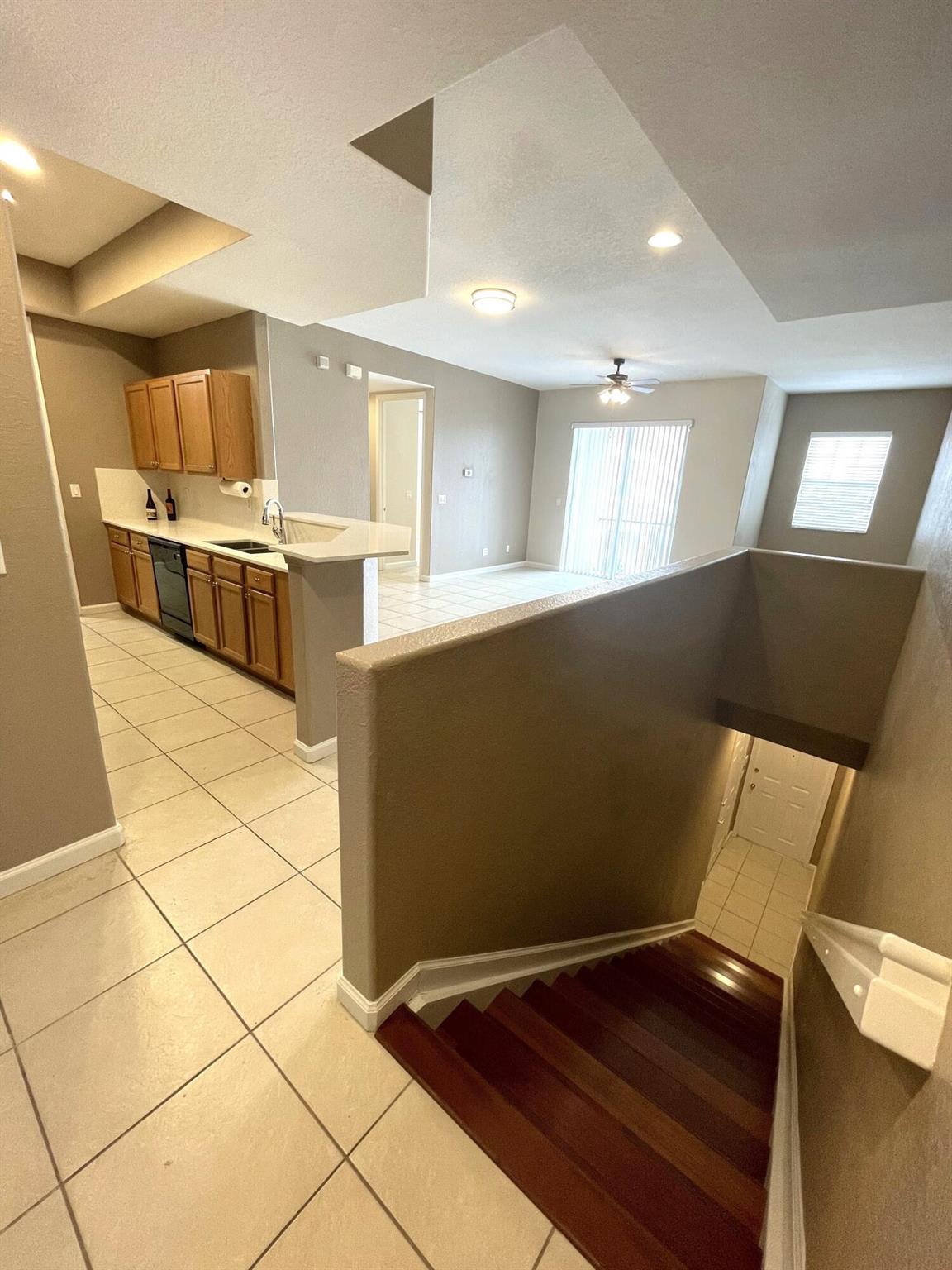 Prime Port St Lucie Location! Spacious 2nd-floor 2-bed, 2-bath condo in the heart of Tradition. Features include a new A/C, modern kitchen with quartz countertops, and a remodeled primary bathroom. Enjoy beautiful porcelain floors, two covered porches, and in-unit laundry room. Additional upgrades: new water heater, freshly painted bedroom, and new clean toilet seats. The attached garage provides extra storage. Community offers: high-speed internet, pool, playground, picnic area with gazebo, and dog park. Pet-friendly. 1st month security and last month upfront as requirement. Renters insurance, HOA application, credit and background check required. Street parking available