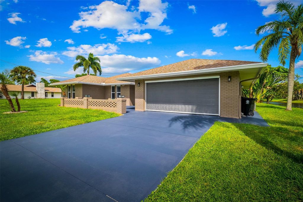 Photo of 1857 SE Bowie St, Port Saint Lucie, FL 34952 (MLS # F10526716)