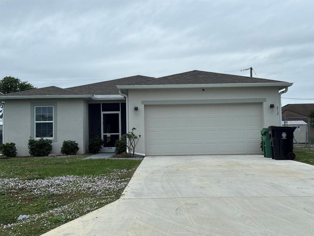 Photo of 612 SW Kenyoun Street, Port Saint Lucie, FL 34983 (MLS # R11041175)