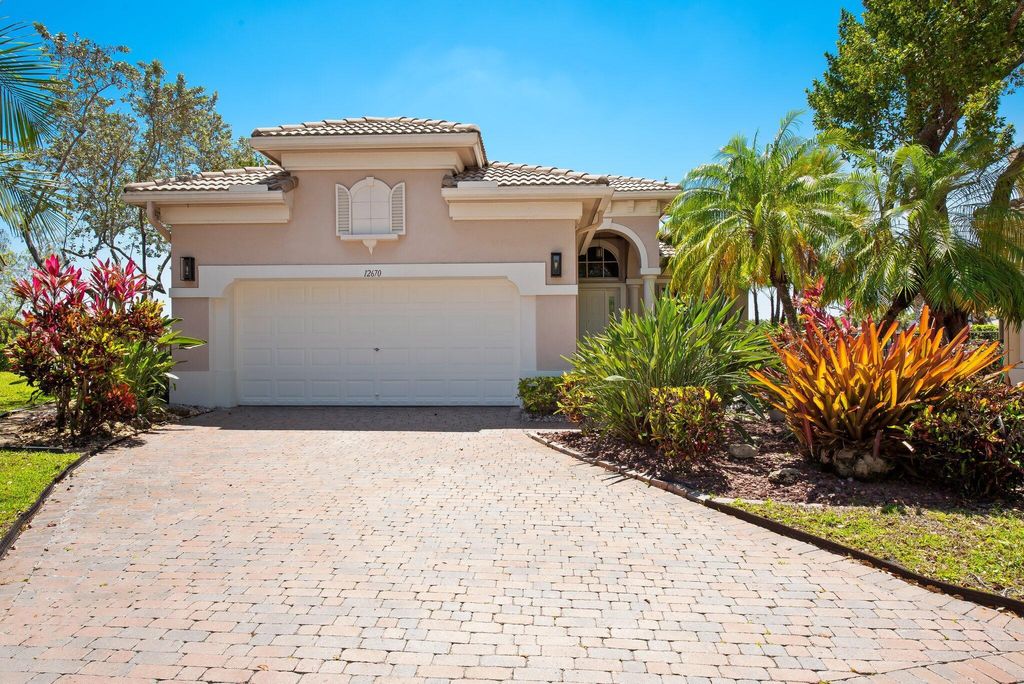 Photo of 12670 NW 78th Manor, Parkland, FL 33076 (MLS # R11083350)