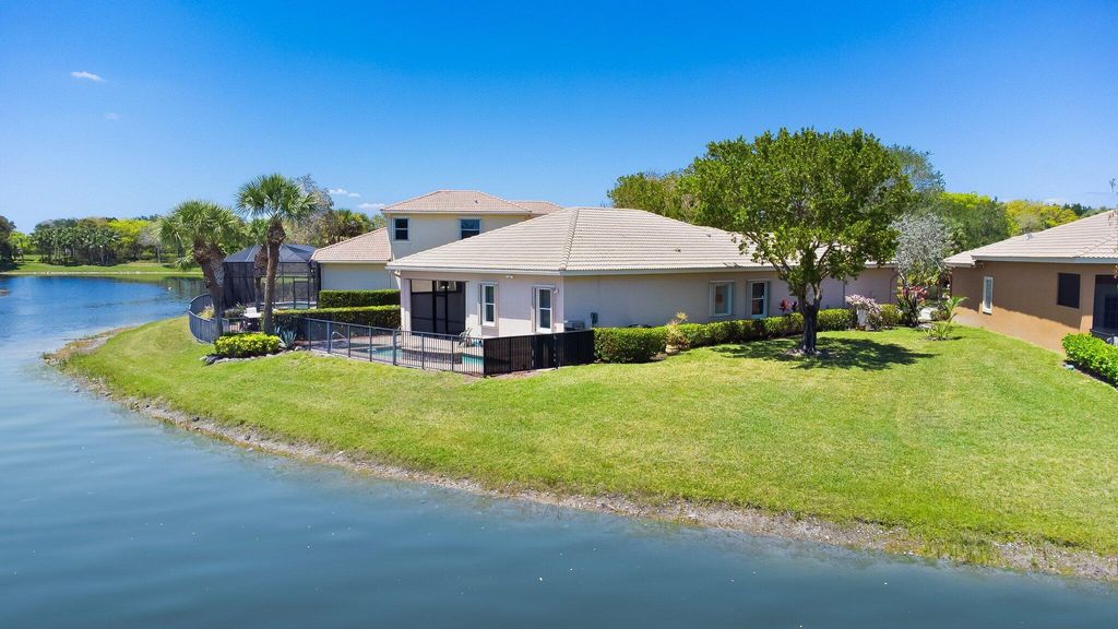 Photo of 12670 NW 78th Manor, Parkland, FL 33076 (MLS # R11083350)