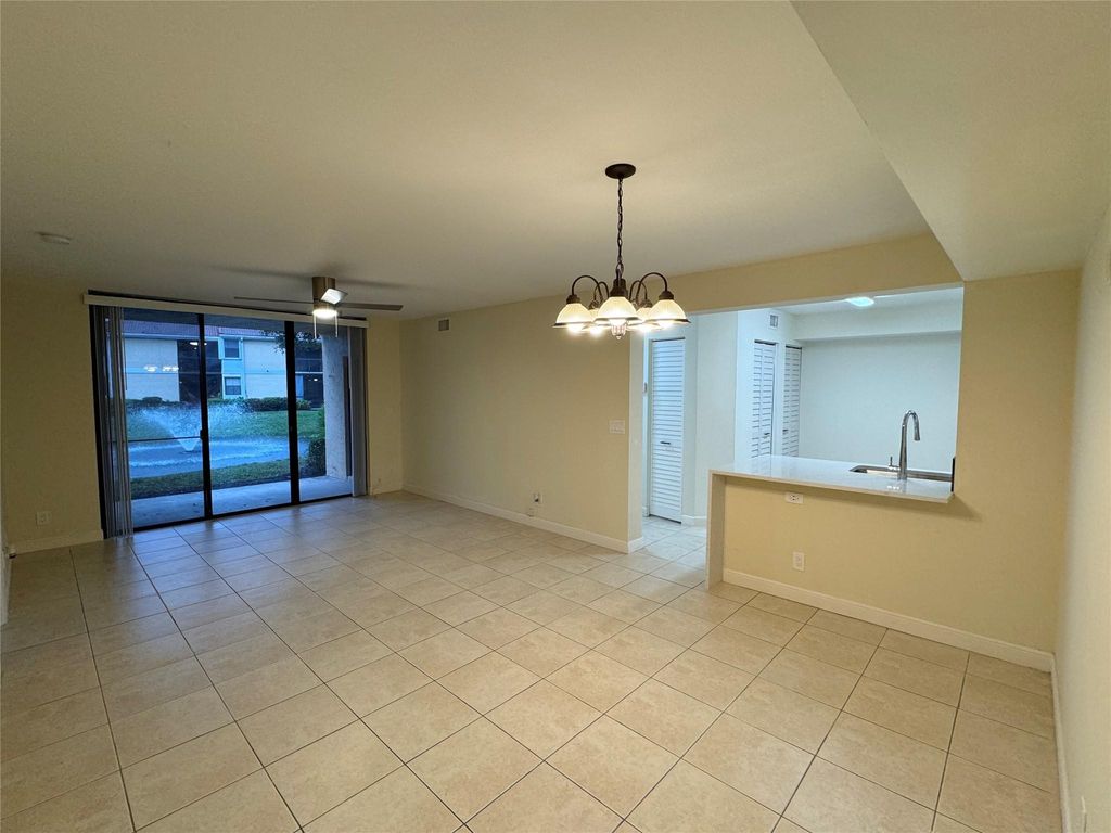 Photo of 5741 Riverside Drive #102, Coral Springs, FL 33067 (MLS # F10401805)