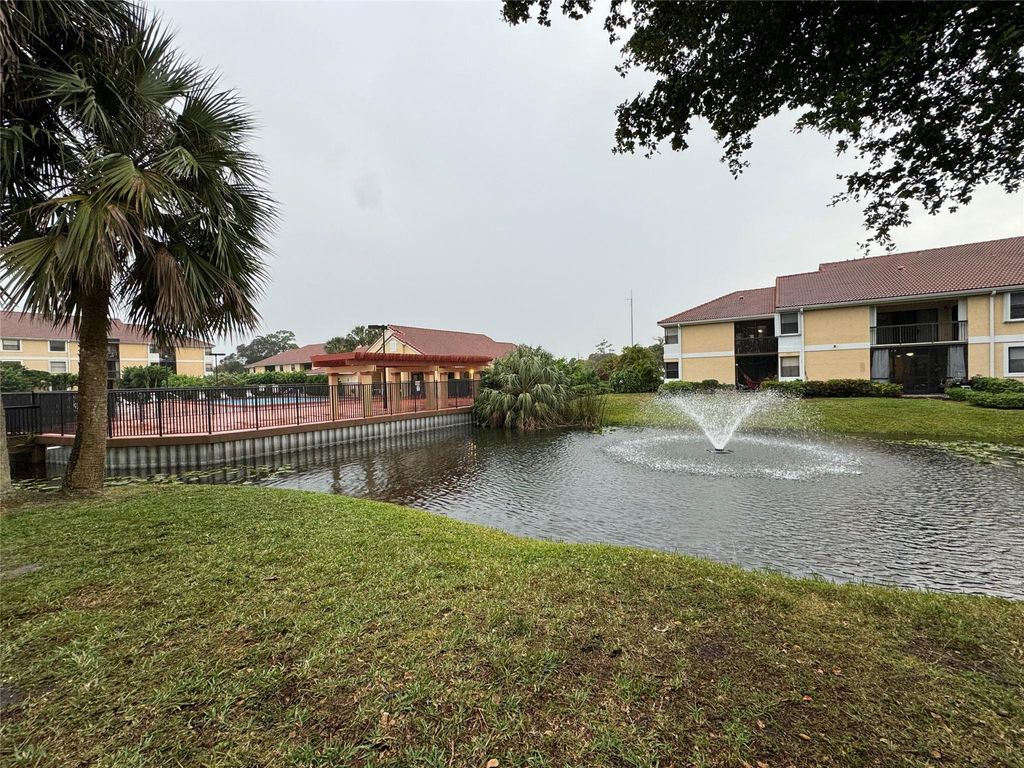 Photo of 5741 Riverside Drive #102, Coral Springs, FL 33067 (MLS # F10401805)
