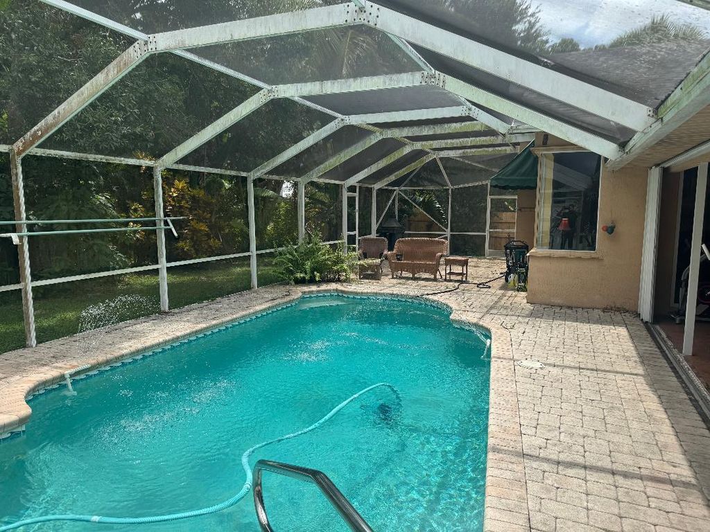 Photo of 2449 SW Aberdeen Street, Port Saint Lucie, FL 34953 (MLS # R11114922)