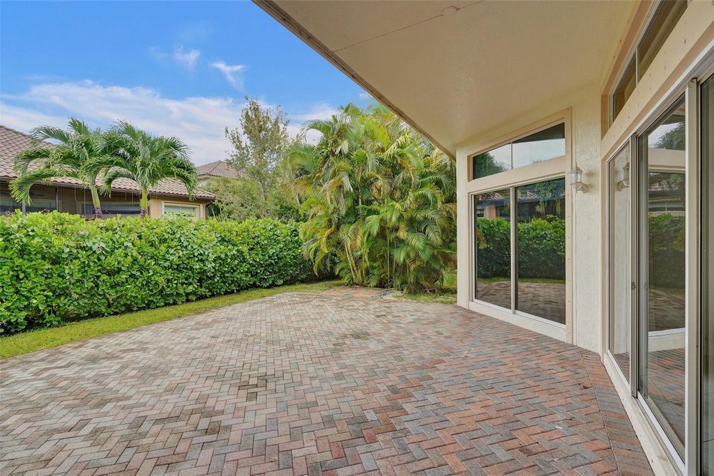 Photo of 7467 NW 114th Terrace, Parkland, FL 33076 (MLS # F10456803)