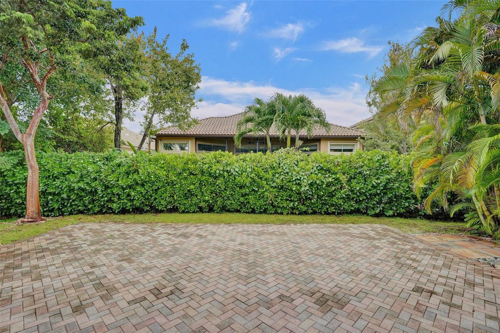 Photo of 7467 NW 114th Terrace, Parkland, FL 33076 (MLS # F10456803)