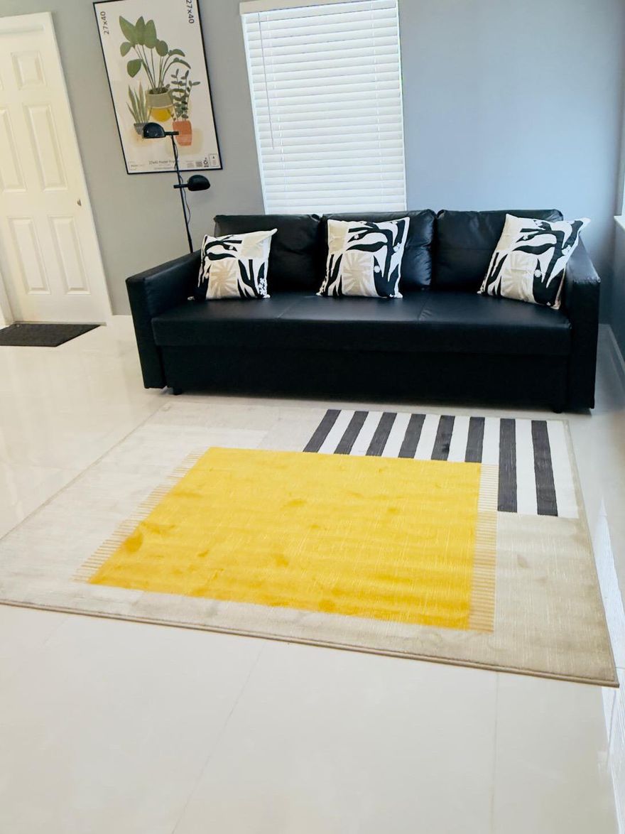 Welcome Home!  Discover this beautiful updated 2-BED,1-Bath 1Den, Step inside to a modern featuring elegant porcelain flooring, a freshly renovated bathroom, and brand new kitchen with quartz countertops and stainless steel appliances. The home also includes a new electrical panel ,  tankless water heater and fresh interior paint. Enjoy the spacious large backyard, perfect for outdoor entertaining, with plenty of room for RV or Boat storage. Located in a highly desirable area just of US-1 and close to shopping, dining, and everyday convenience.