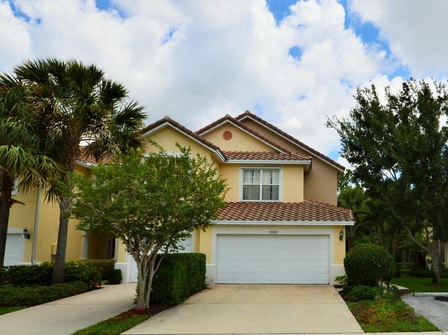 Gorgeous and tastefully decorated 2 story townhouse located in Pinewood Lakes gated community. Shows like a model!You'll enjoy its location, walking distance to community pool,  clubhouse and children's playground. Located close to commerce, schools and shopping, 15 minutes from PB International Airport.Home features: 3 Bedrooms and 2.5 Bath with 2 cars garage,tile floors in living area and new carpeting in bedrooms, bright living/dining room with 3 panel sliding door to outdoor sitting and private oversized yard. Kitchen has Cordian countertops, 42''custom white wood cabinets, oversized pantry and lot of room for breakfast table. Master Bedroom with high ceiling have private view and shower with double vanity in Master Bath.Home is in perfect condition and ready for a new owner.