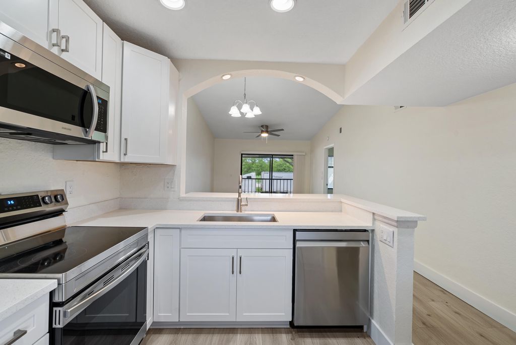 Photo of 6585 Somerset Drive #202, Boca Raton, FL 33433 (MLS # R11001003)