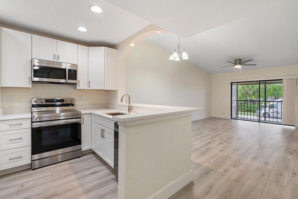 Photo of 6585 Somerset Drive #202, Boca Raton, FL 33433 (MLS # R11001003)