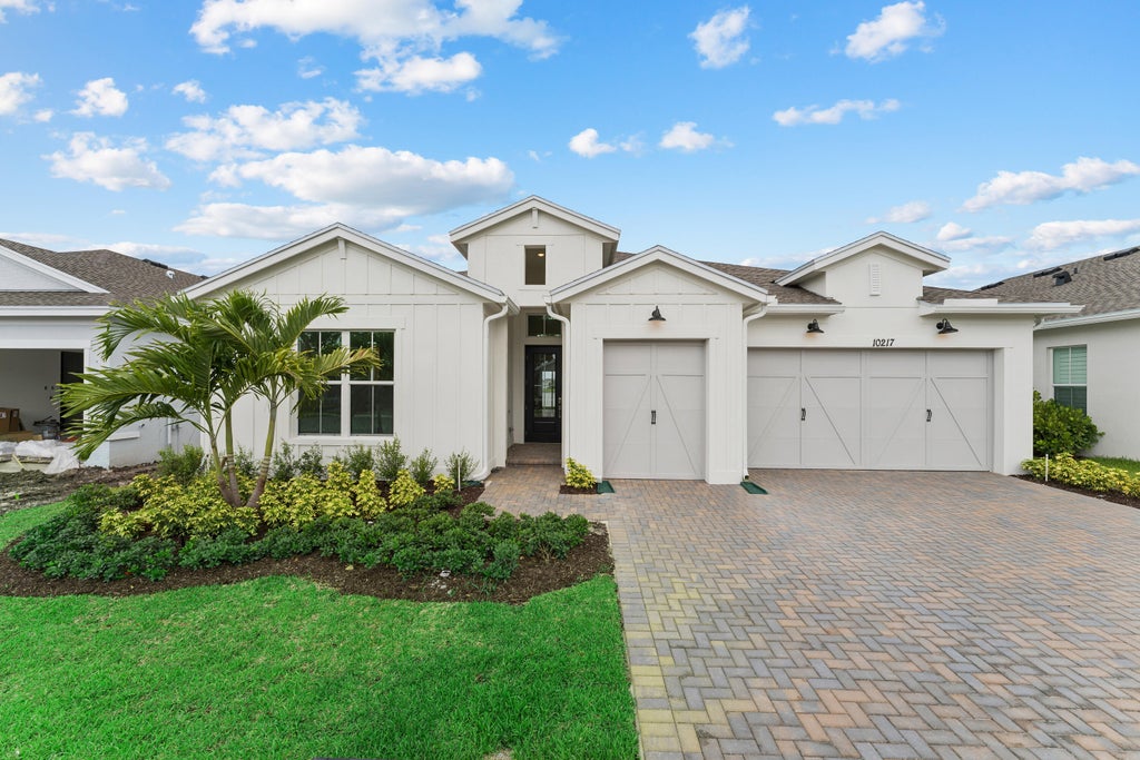 Photo of 10225 NW FIELD FLOWER Trail #233, Port Saint Lucie, FL 34987 (MLS # B26071799)