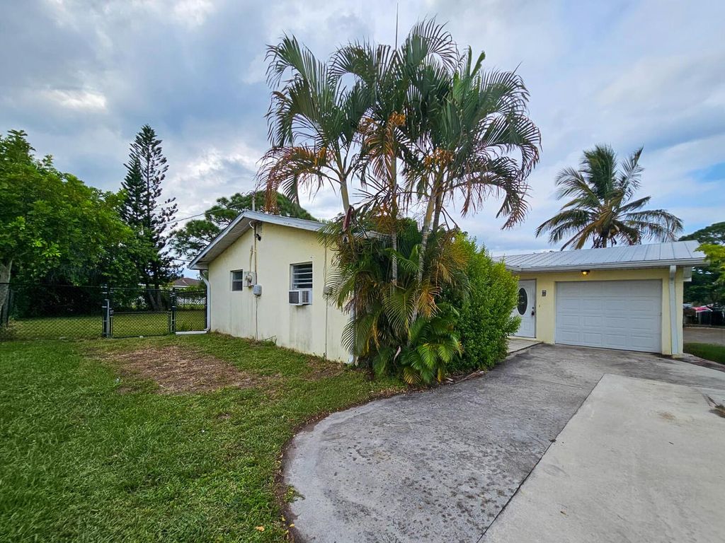 Photo of 106 NW Curtis Street, Port Saint Lucie, FL 34983 (MLS # R11122572)