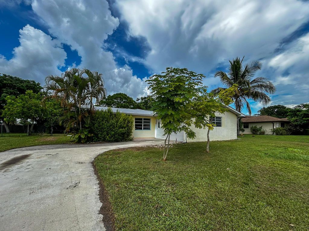 Photo of 106 NW Curtis Street, Port Saint Lucie, FL 34983 (MLS # R11122572)