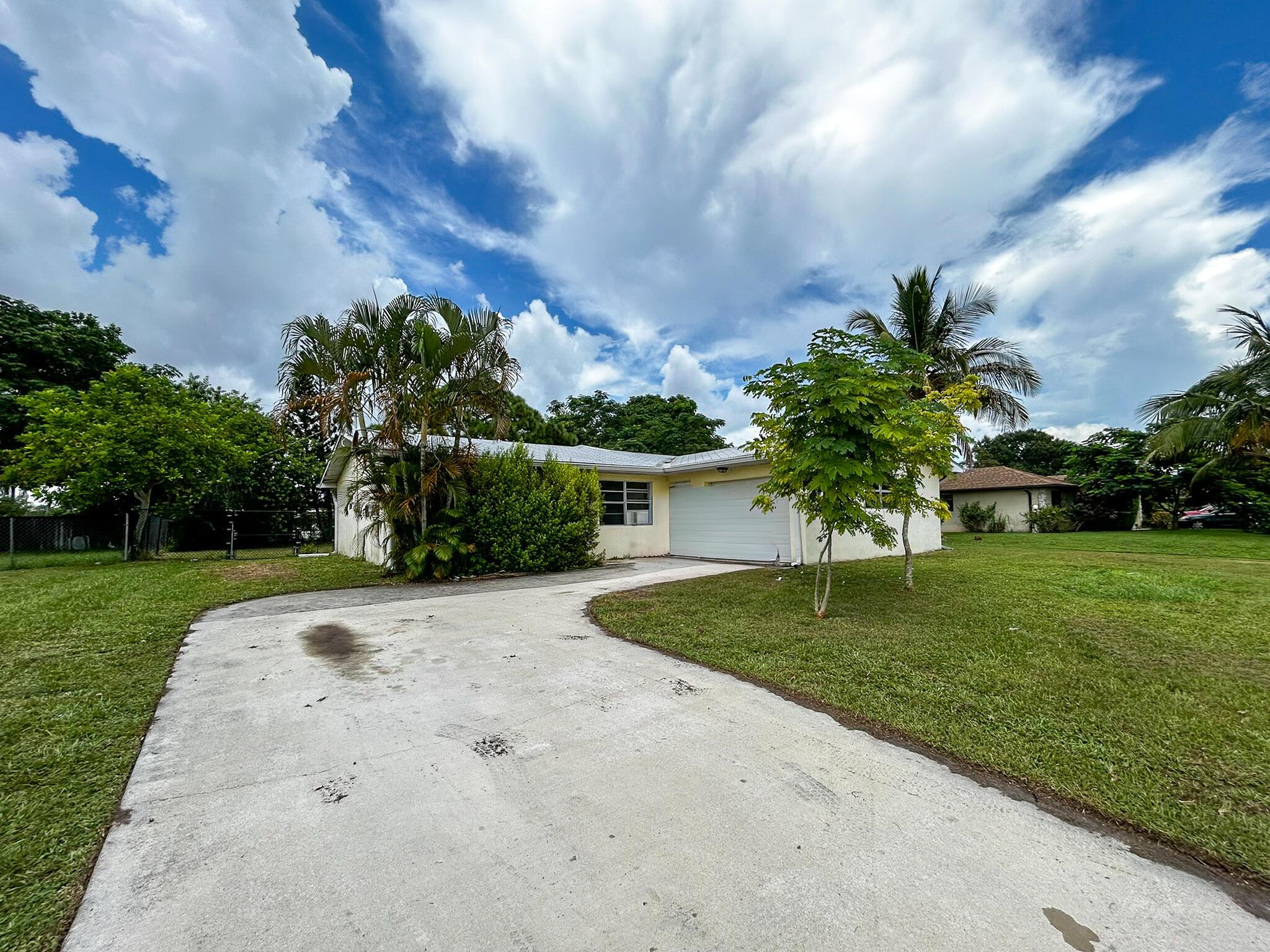 Endless Potential Awaits! This 3BD/2BA CBS home in Port St. Lucie offers a solid foundation with room to update and make your own. Features include a spacious living area, tiled floors, open kitchen, fenced yard, and 1-car garage. Bedrooms and baths are ready for your personal touch, giving you the opportunity to renovate and add instant value. With no HOA, you'll have the freedom to customize without restrictions. Conveniently located near US-1, schools, parks, shopping, and dining. Perfect for investors or homeowners ready to bring their vision to life!