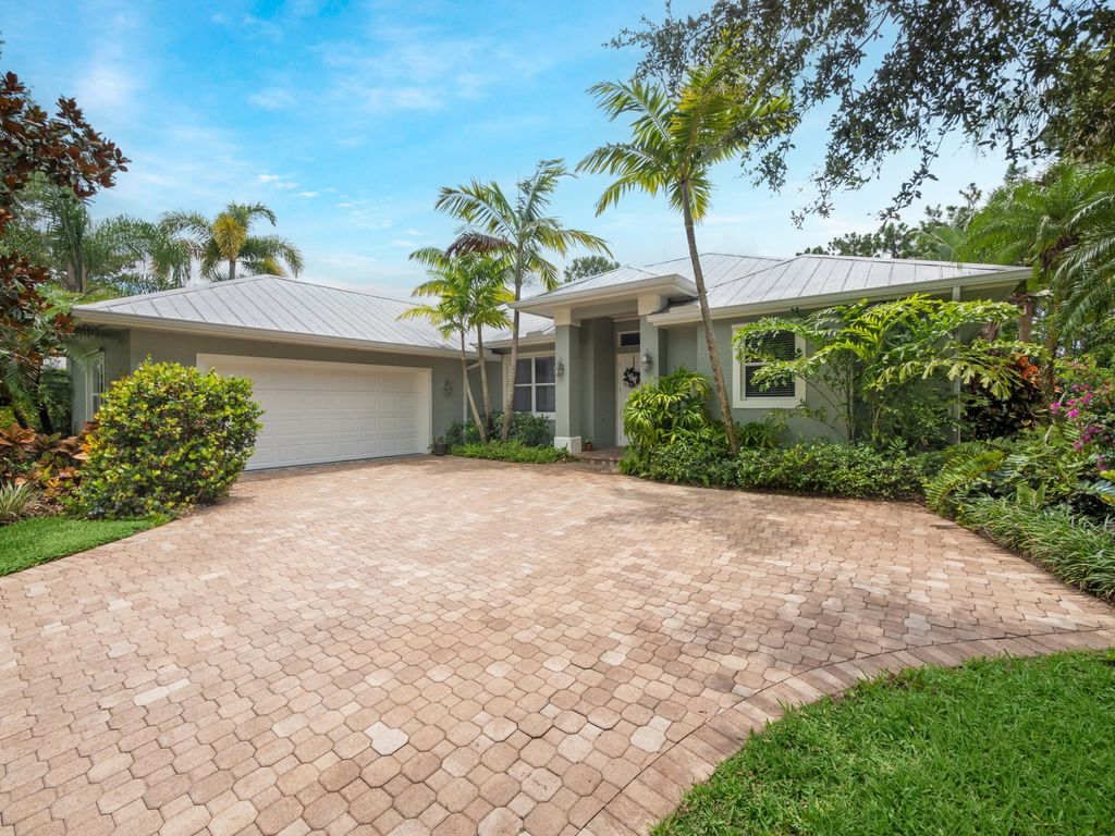 Photo of 8565 SW Sea Captain Drive Dr, Stuart, FL 34997 (MLS # R10811442)