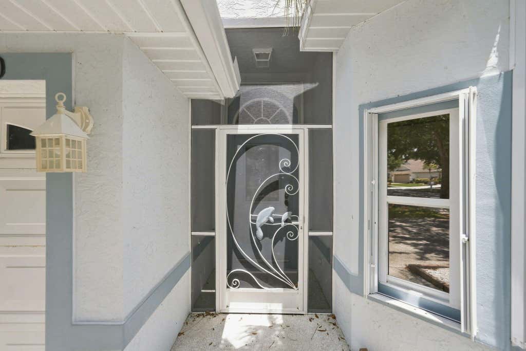 Photo of 1720 Pondberry Lane, Port Saint Lucie, FL 34952 (MLS # B26061325)