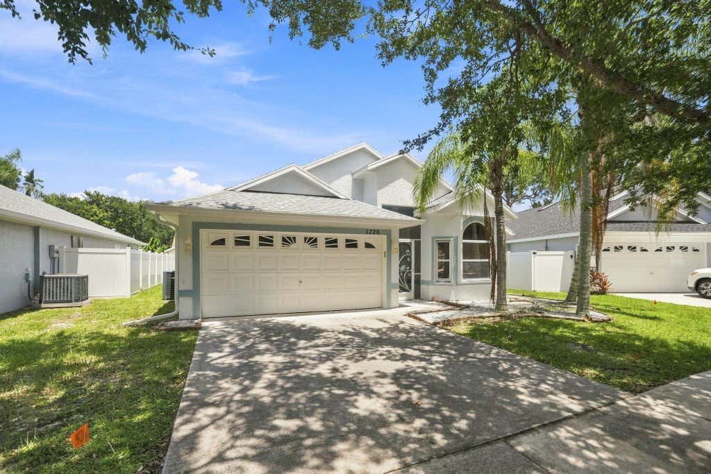 Photo of 1720 Pondberry Lane, Port Saint Lucie, FL 34952 (MLS # B26061325)