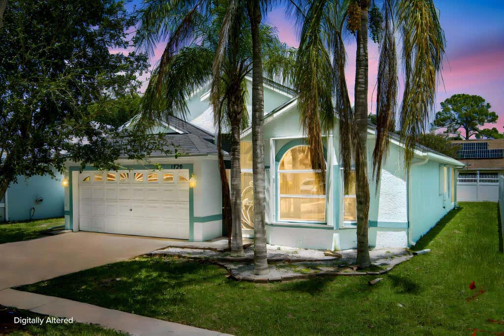 Photo of 1720 Pondberry Lane, Port Saint Lucie, FL 34952 (MLS # B26061325)