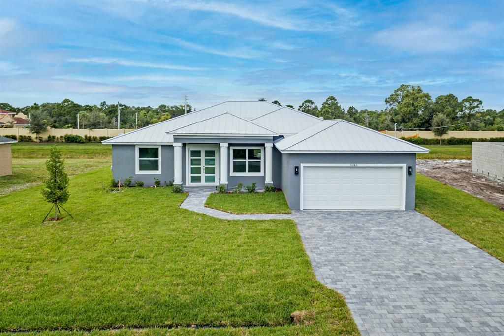 Photo of 5343 NW Aloha Street, Port Saint Lucie, FL 34986 (MLS # R10758755)