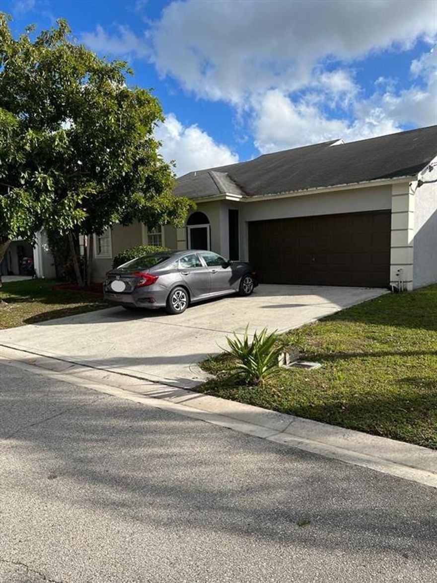 This 3 bedroom, 2 bathroom home with a 2 car garage will not last! Home has an open kitchen floor plan  with gas oven. Updated master bath. Property is close to shopping and restaurants.   NOT A SHORT SALE as seller received payoff and adjusted pricing