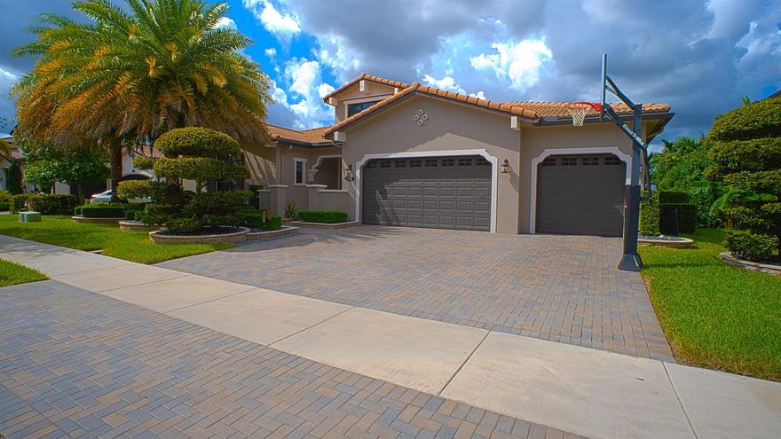 Luxurious 5-bed, 4-bath estate in the prestigious gated community of Watercrest, Parkland. Featuring a private pool, outdoor kitchen, and paid-off solar panels, this home blends elegance with modern efficiency. Enjoy a 3-car garage, open living spaces, and lake views. Community amenities include a state-of-the-art clubhouse, kids' indoor/outdoor play areas, cabanas overlooking the lake, billiards room, and a private bar/lounge for events. Live the resort lifestyle every day in Parkland's most desirable waterfront enclave.The details don't stop there!  2 premium LIEBHERR stainless steel built-in double refrigerator and freezer units, Fully Built-Out Air-Conditioned Garage Conversion, finished with a one-of-a-kind sliding glass door system, integrated dry sauna, and more ...